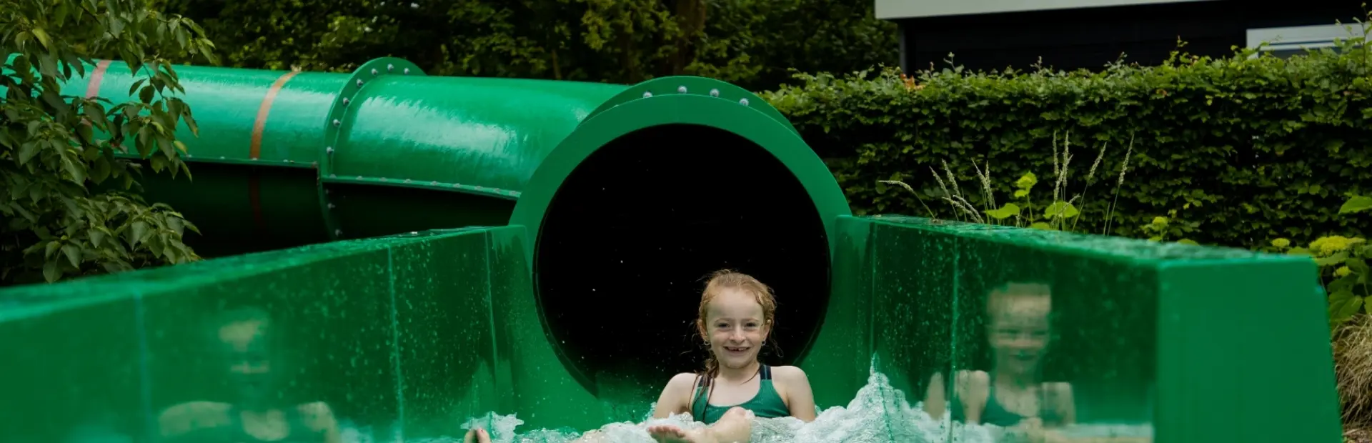 Zwembad met waterglijbaan Kaps